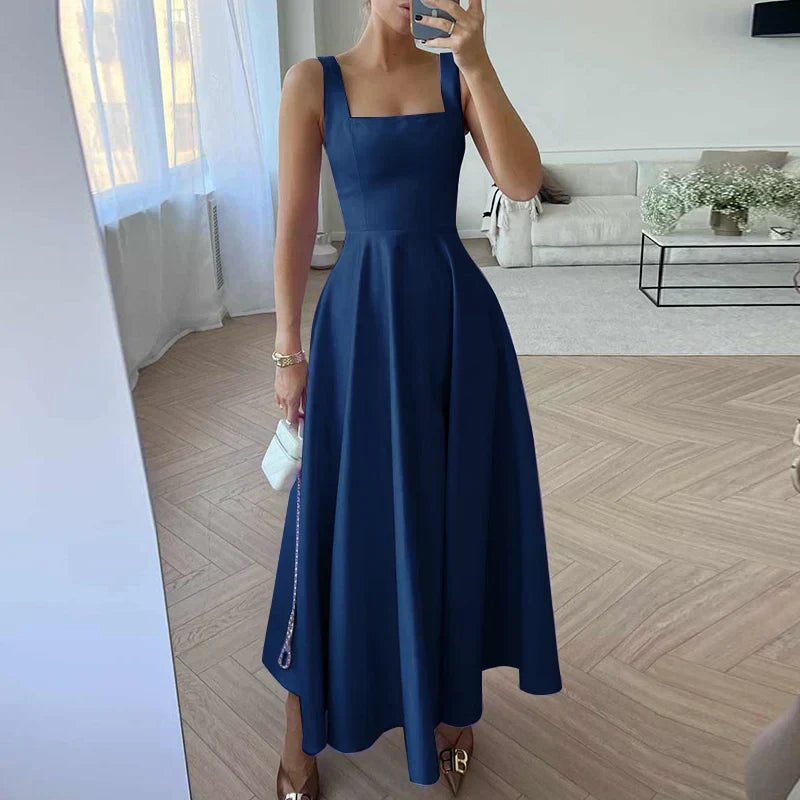 https://cdn.shopify.com/s/files/1/0646/2626/2284/files/Arlette-_rmelloses_Maxikleid_mit_hoher_Taille_f_r_Frauen_Dunkelblau_1.webp?v=1740785151