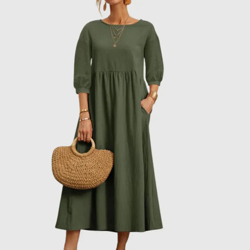 https://cdn.shopify.com/s/files/1/0646/2626/2284/files/Assunta-_L_ssiges_atmungsaktives_Kleid_Gr_n.webp?v=1740787855