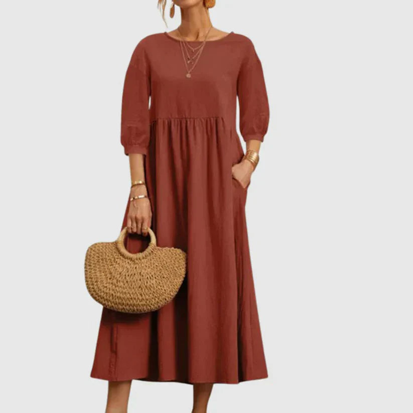 https://cdn.shopify.com/s/files/1/0646/2626/2284/files/Assunta-_L_ssiges_atmungsaktives_Kleid_Rot.webp?v=1740787824