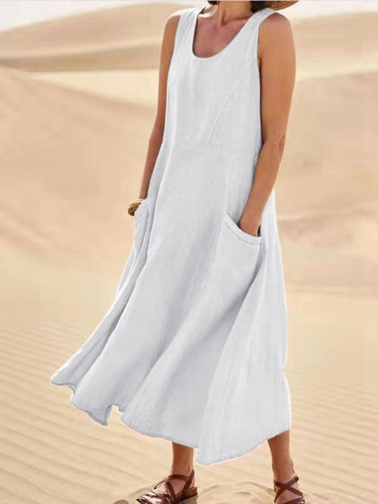 https://cdn.shopify.com/s/files/1/0646/2626/2284/files/Leinenkleid-Lockere-Passform-Armellos-Fliessendes-Kleid-Sommerkleid-Leyna-Moda-2_6147b253-f49d-47e4-9474-af16d94a6ab1.jpg?v=1740484142
