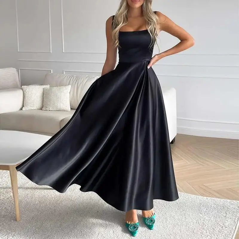 https://cdn.shopify.com/s/files/1/0646/2626/2284/files/Arlette-_rmelloses_Maxikleid_mit_hoher_Taille_f_r_Frauen_Schwarz_2-6cfa-4cd2-962e-3f7b970e2e61.webp?v=1740785186