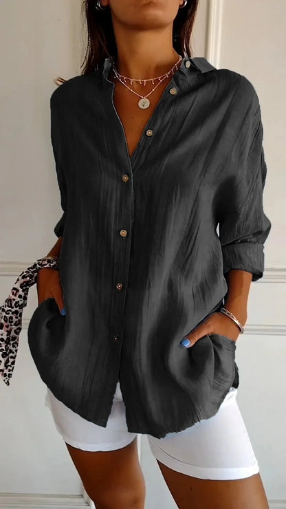 https://cdn.shopify.com/s/files/1/0646/2626/2284/files/Asella-_Elegantes_Shirt_mit_Faltenfrisur_Schwarz.webp?v=1740786677