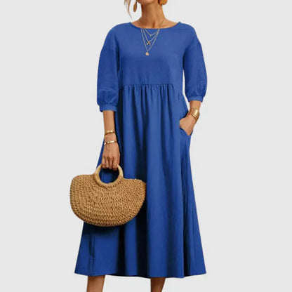 https://cdn.shopify.com/s/files/1/0646/2626/2284/files/Assunta-_L_ssiges_atmungsaktives_Kleid_Blau.webp?v=1740787843
