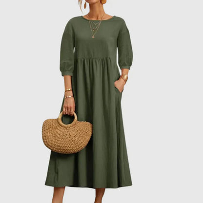 https://cdn.shopify.com/s/files/1/0646/2626/2284/files/Assunta-_L_ssiges_atmungsaktives_Kleid_Gr_n.webp?v=1740787855