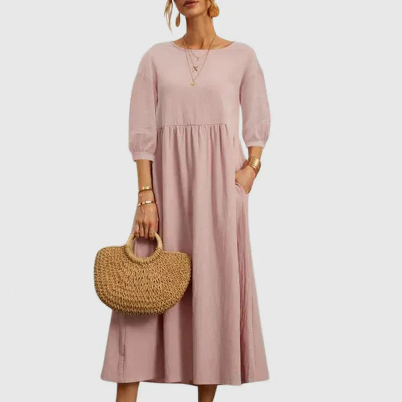 https://cdn.shopify.com/s/files/1/0646/2626/2284/files/Assunta-_L_ssiges_atmungsaktives_Kleid_Rosa.webp?v=1740787792
