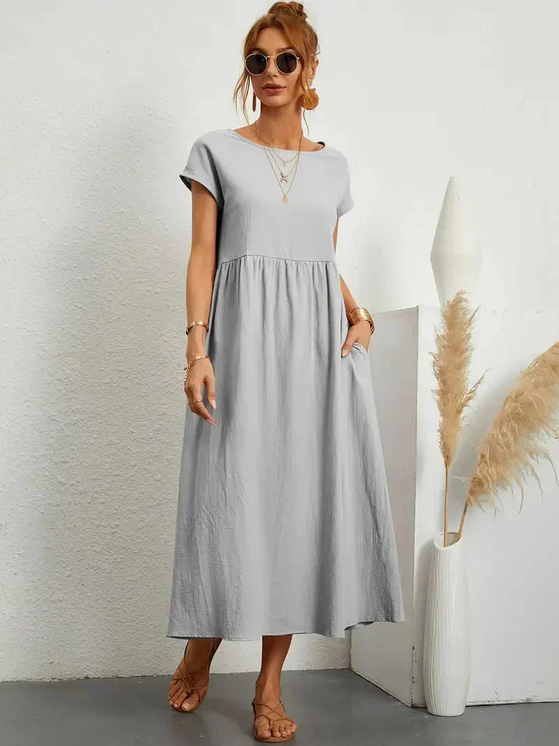 https://cdn.shopify.com/s/files/1/0646/2626/2284/files/Cecilia-Maxikleid-Lassiges-lockeres-Kleid-fur-den-Sommer-Leyna-Moda-11.webp?v=1740404830