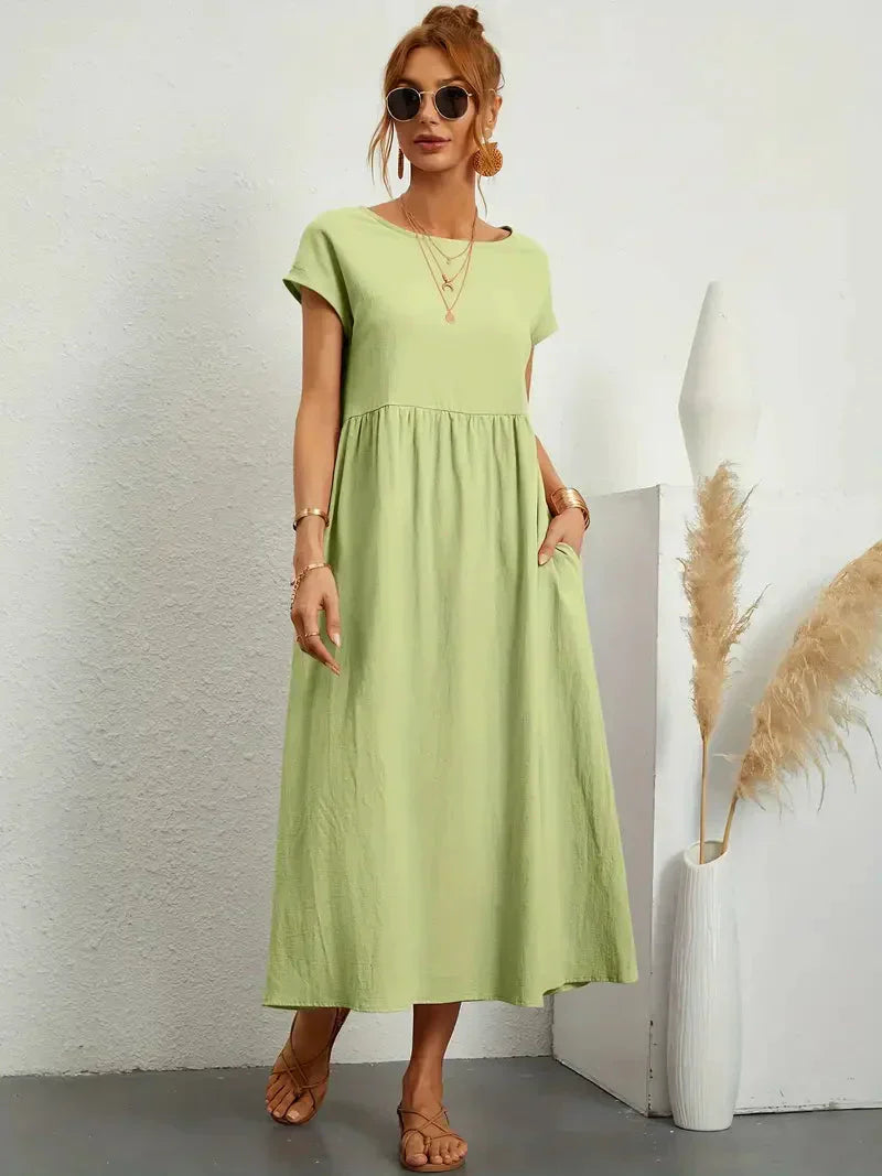 https://cdn.shopify.com/s/files/1/0646/2626/2284/files/Cecilia-Maxikleid-Lassiges-lockeres-Kleid-fur-den-Sommer-Leyna-Moda-21.webp?v=1740404831