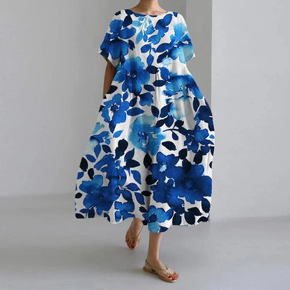 https://cdn.shopify.com/s/files/1/0646/2626/2284/files/P148Dames-Herfst-Casual-Losse-Jurk-Met-Bloemenprint-Casual-Korte-Mouw-Grote-Swing-Losse-Jurk-Mode-Ronde.jpg?v=1740393288