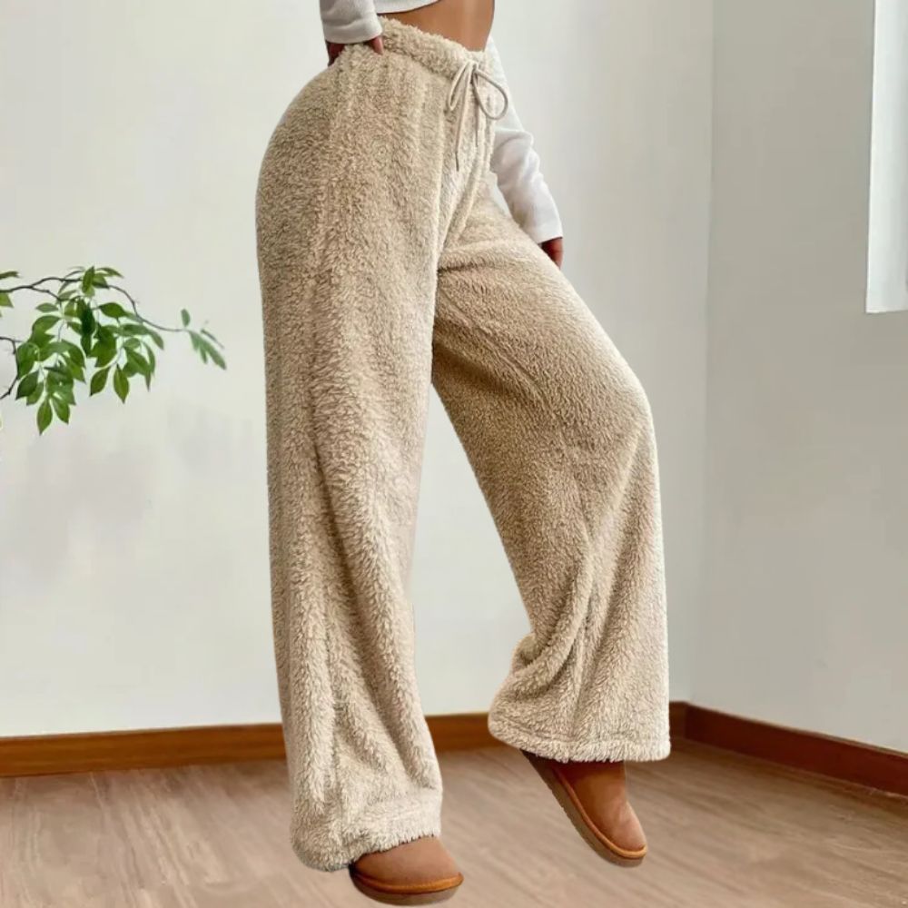 https://cdn.shopify.com/s/files/1/0646/2626/2284/files/Udele-_Warme_kuschelige_Pl_schhosen_f_r_Frauen_Aprikose.jpg?v=1740548038