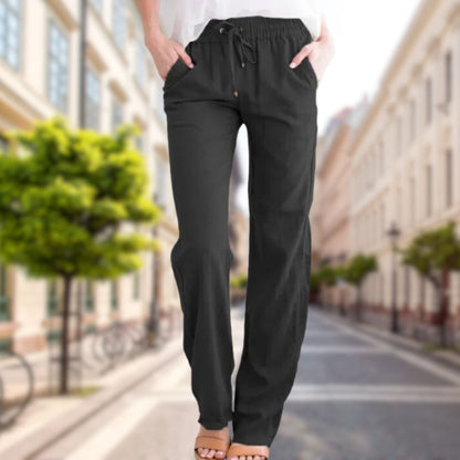 https://cdn.shopify.com/s/files/1/0646/2626/2284/files/Urbina-_Atmungsaktive_Sommerhosen_aus_Leinen_Schwarz.jpg?v=1740548499