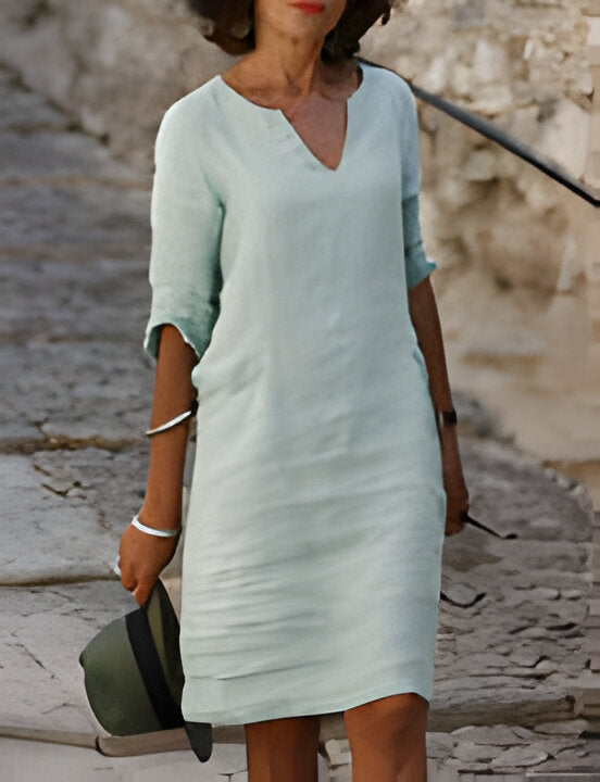 https://cdn.shopify.com/s/files/1/0646/2626/2284/files/Yuliana-_Modisches_Sommerkleid_Hellgr_n.jpg?v=1740759611
