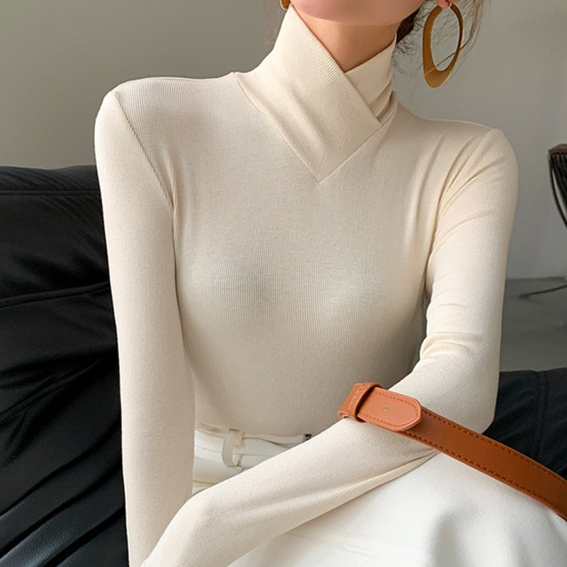 https://cdn.shopify.com/s/files/1/0646/2626/2284/files/mmM3Stand-up-Collar-Long-sleeved-Stretch-T-shirt-Women-s-Fall-winter-Fleece-Padded-Warm-Basic_bbfc5a9f-e261-4aeb-bf63-59aea02a2902.jpg?v=1740658972