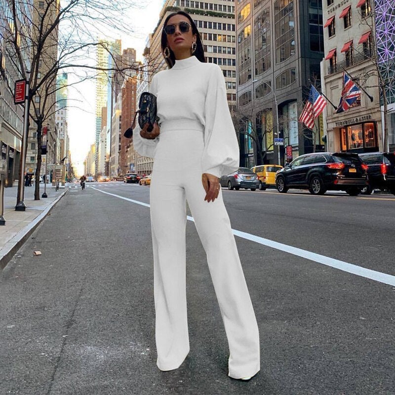 https://cdn.shopify.com/s/files/1/0646/2626/2284/files/reine-farbe-halber-kragen-jumpsuits-308217_624c7052-7d45-4c69-b590-96f7aff24bae.jpg?v=1740484362